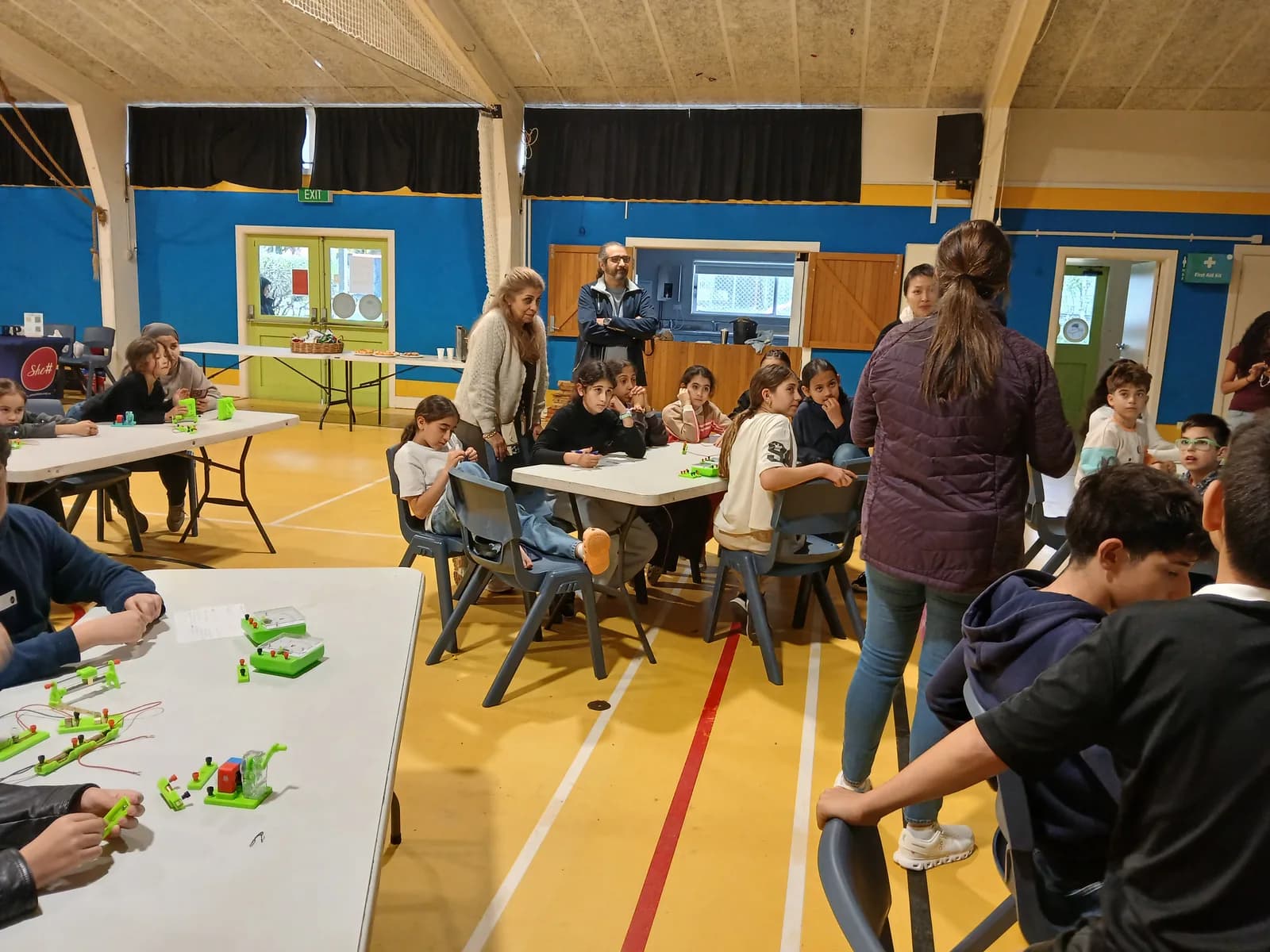 Participants engaged in hands-on electronics activities at Fruitvale Primary School