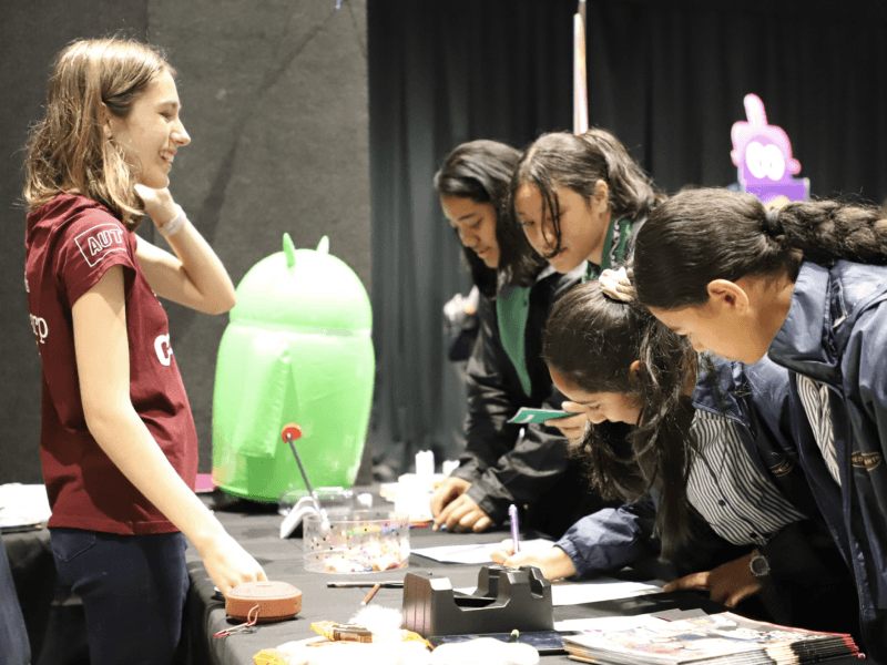 Kids drawing at a booth