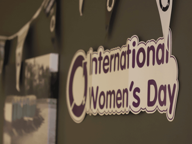 Poster image with text International woman's day