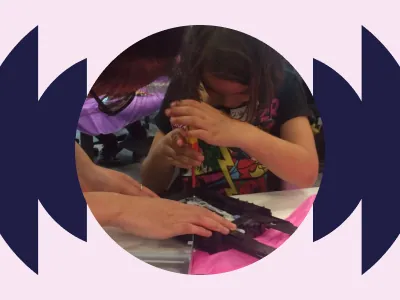 Girl is working on CD player's CD holder