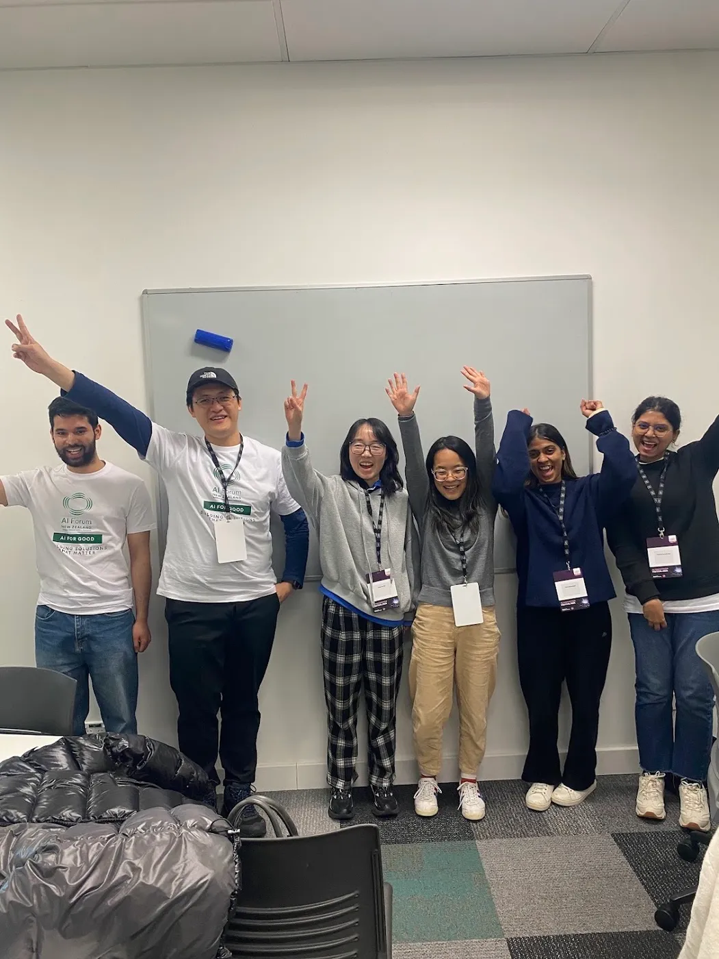 The caffeine team on Friday night at the Aotearoa AI Hackathon Festival 2026.