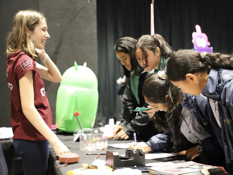 Kids drawing at a booth