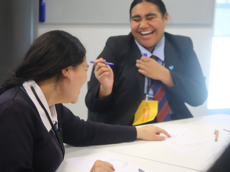 Two girls laughing